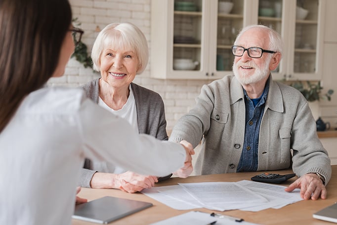 An older couple reviewing annuity plans.