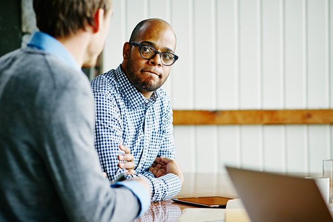 Man listening to advice very seriously